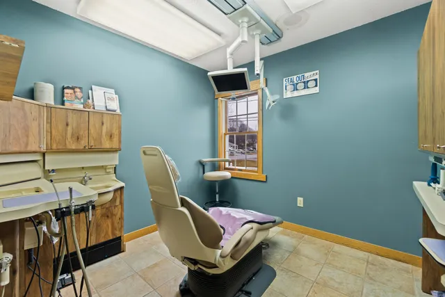 a room with furniture and a chair