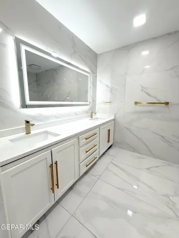 a bathroom with a shower and toilet