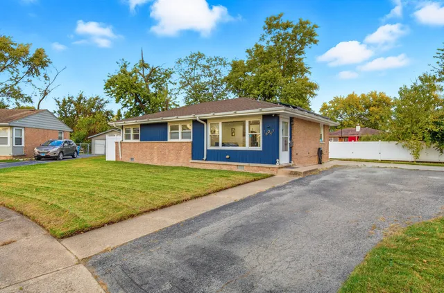 a view of outdoor space yard and front view of a house