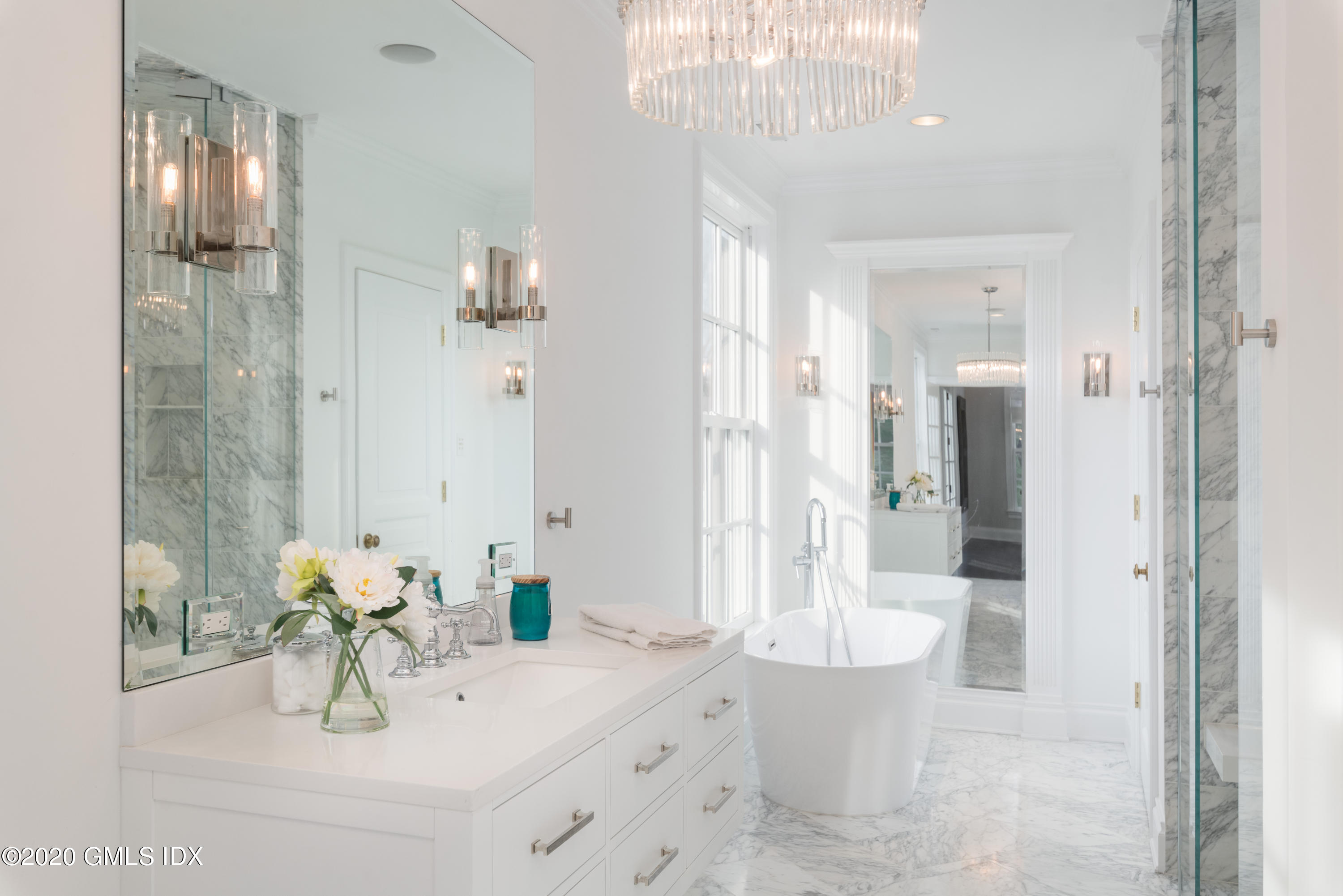 390 Round Hill Road Greenwich, CT 06831 - Photo 17 of 31 a bathroom with a sink a toilet and shower