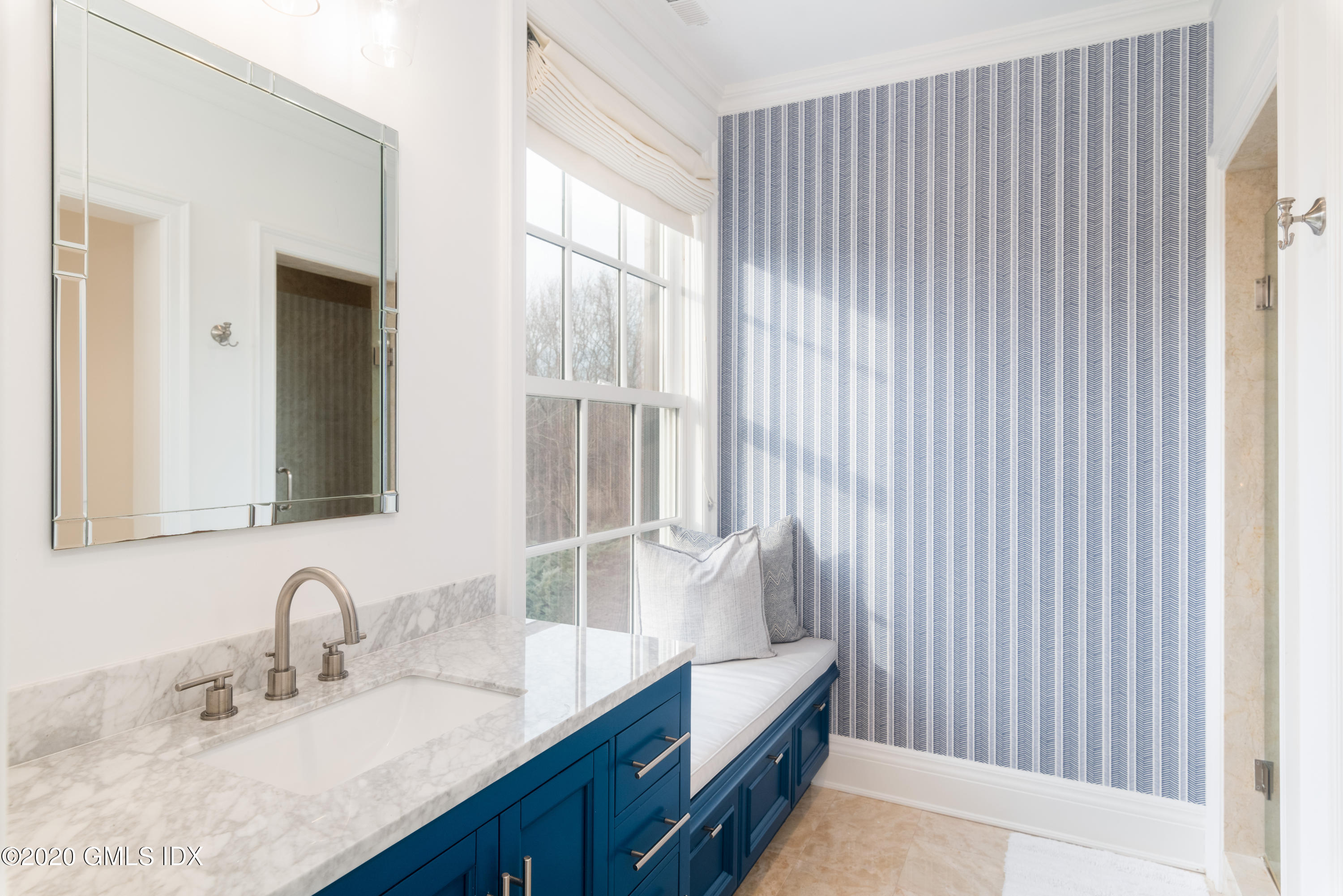390 Round Hill Road Greenwich, CT 06831 - Photo 20 of 31 a bathroom with a granite countertop sink and a mirror