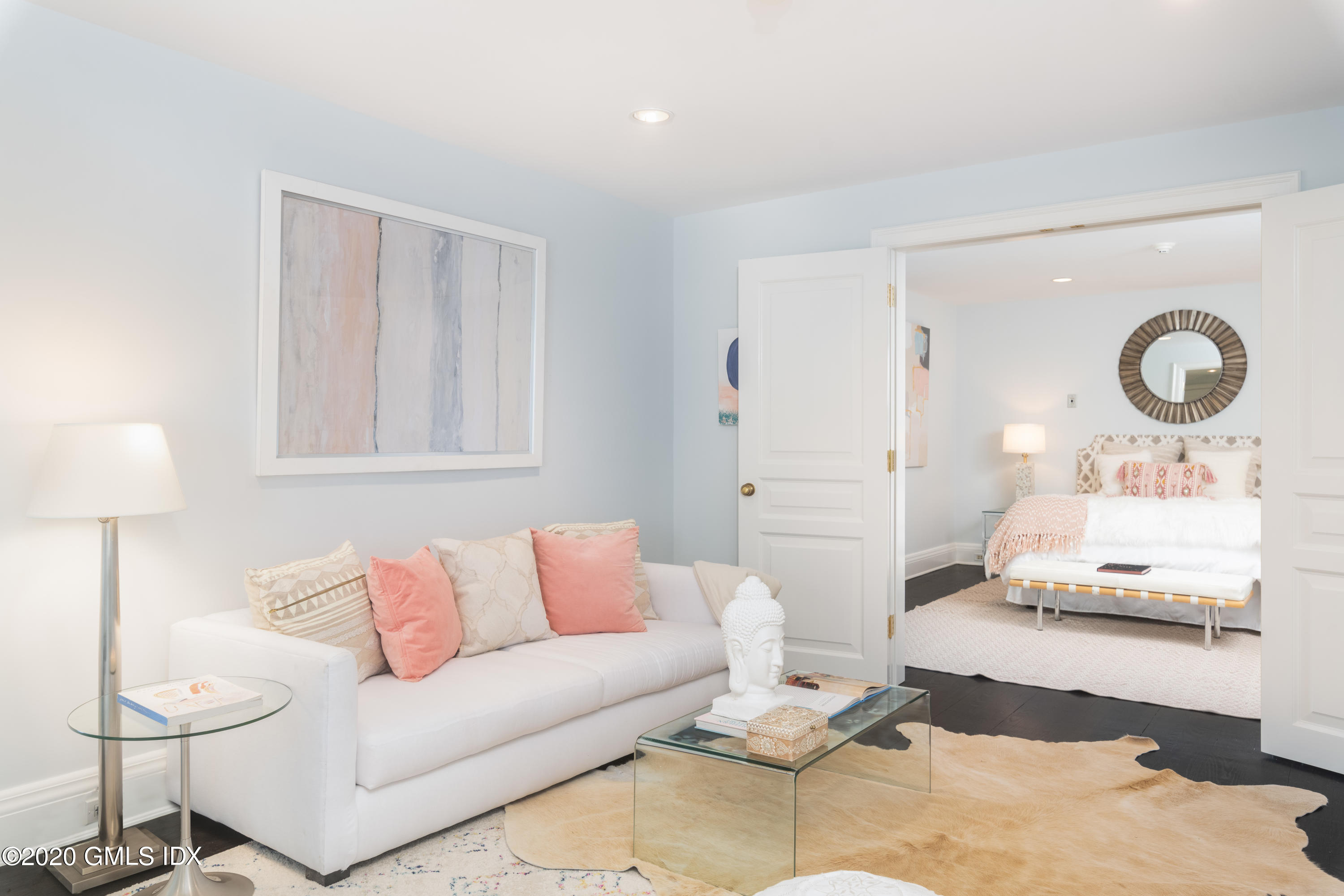 390 Round Hill Road Greenwich, CT 06831 - Photo 24 of 31 a living room with furniture and a lamp