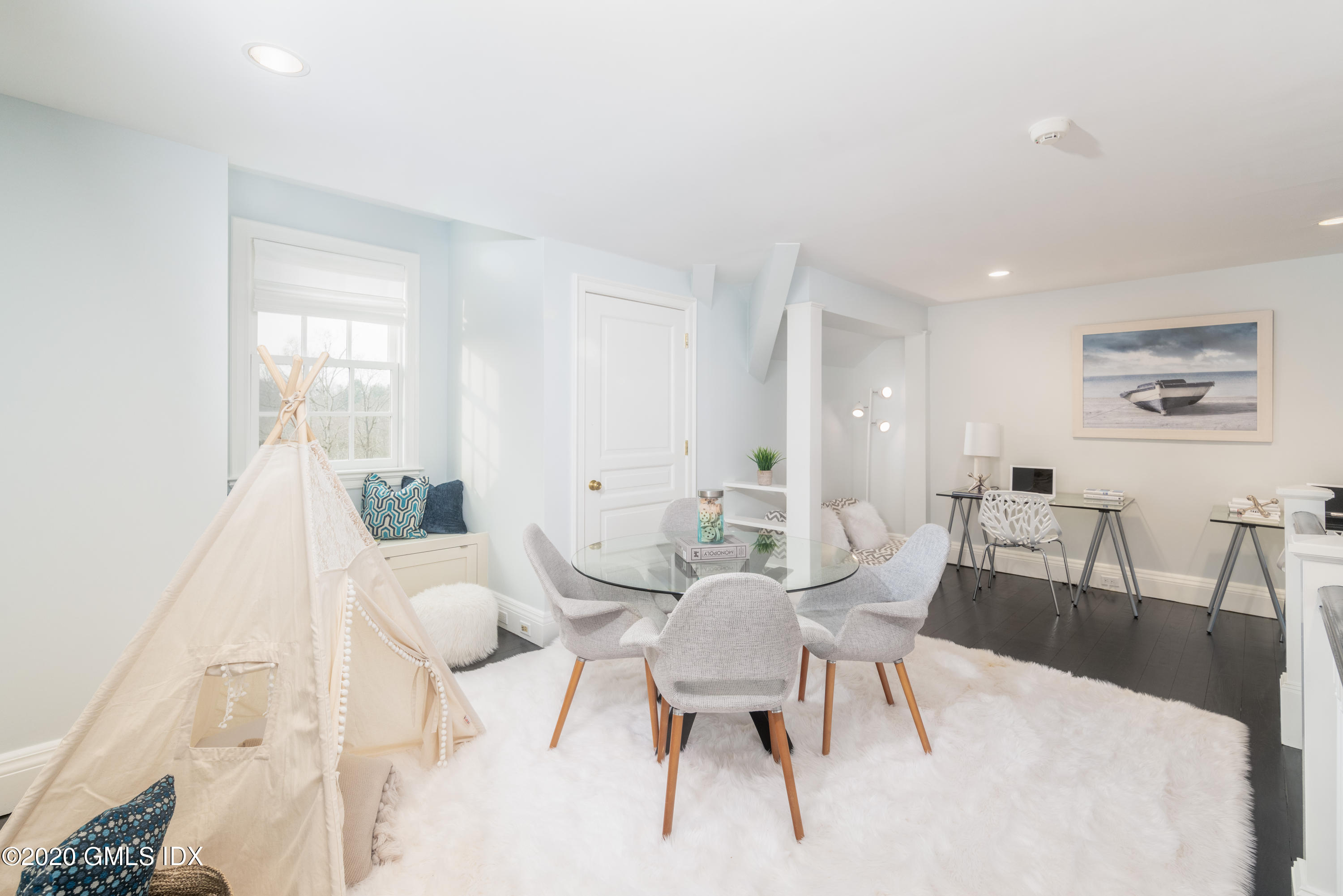 390 Round Hill Road Greenwich, CT 06831 - Photo 25 of 31 a view of a dining room with furniture
