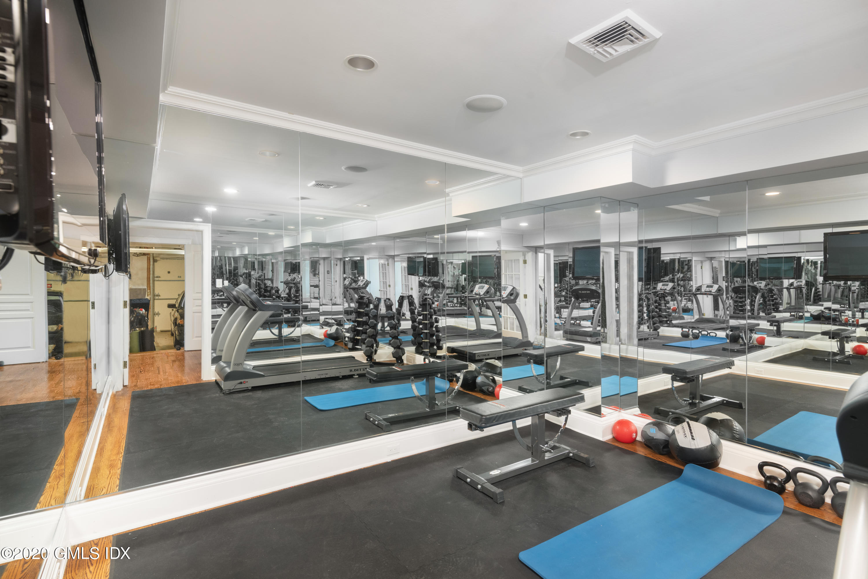 390 Round Hill Road Greenwich, CT 06831 - Photo 27 of 31 a view of a room with gym equipment
