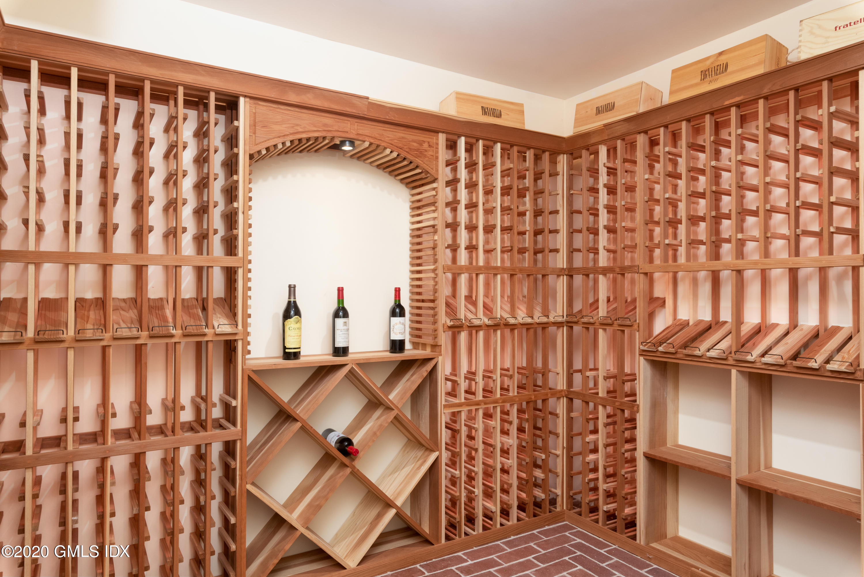 390 Round Hill Road Greenwich, CT 06831 - Photo 29 of 31 a view of walk in closet with clothes and shoes