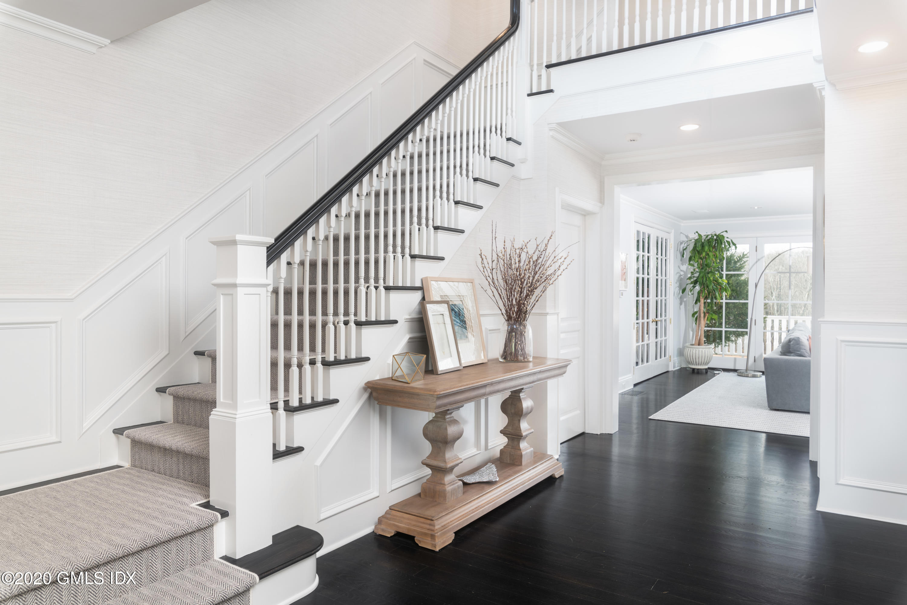 390 Round Hill Road Greenwich, CT 06831 - Photo 3 of 31 a view of entryway and hall with wooden floor