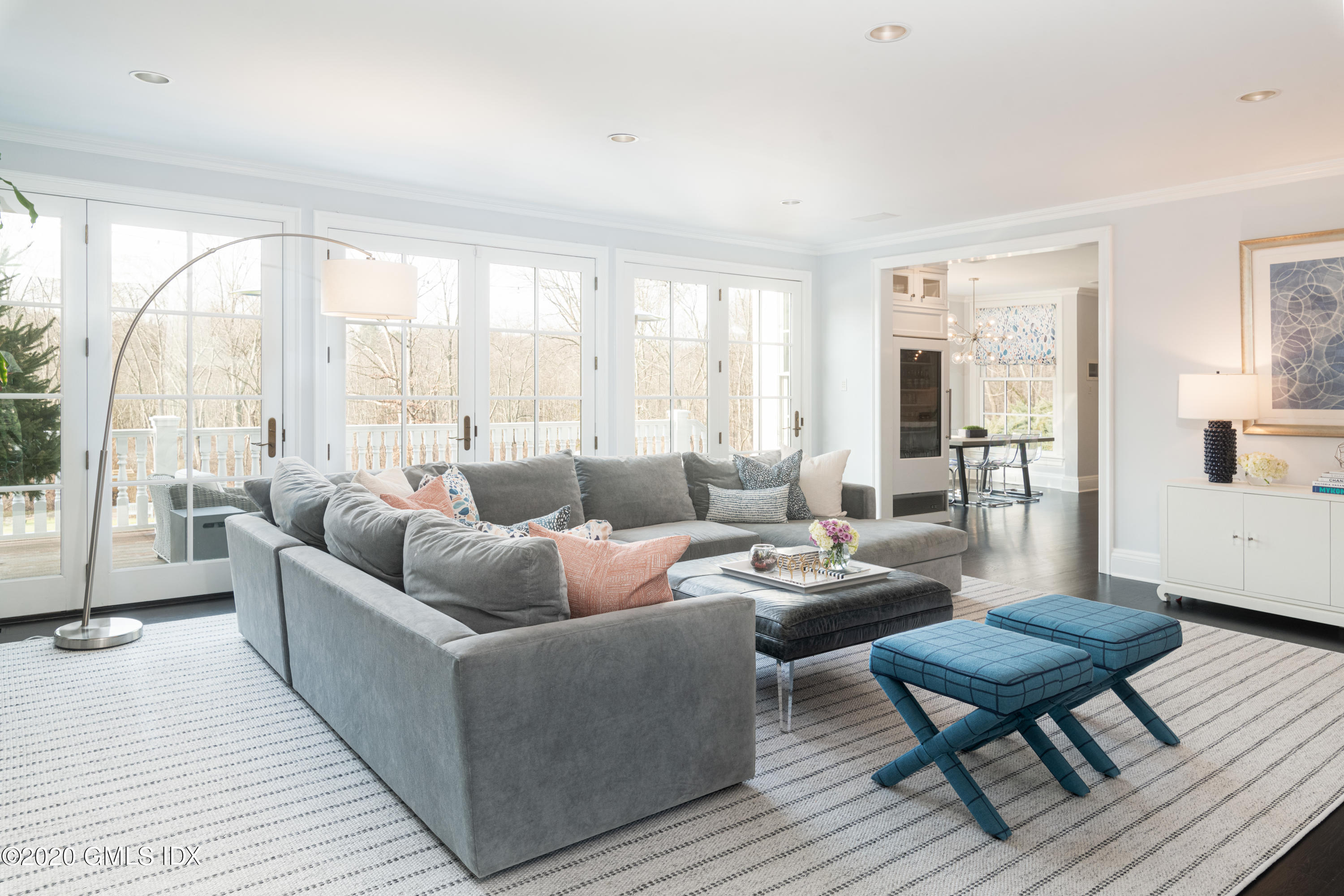 390 Round Hill Road Greenwich, CT 06831 - Photo 5 of 31 a living room with furniture and a large window