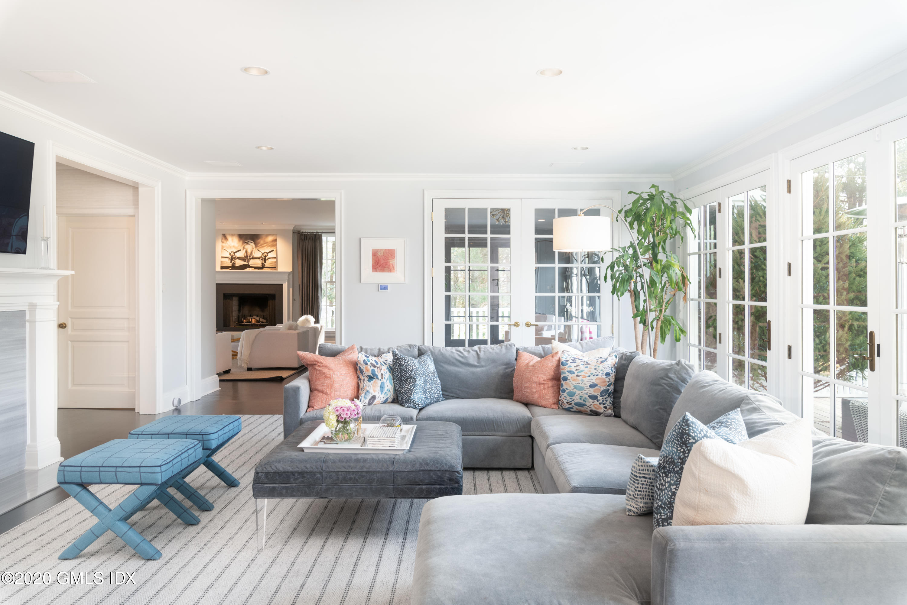 390 Round Hill Road Greenwich, CT 06831 - Photo 6 of 31 a living room with furniture and a large window
