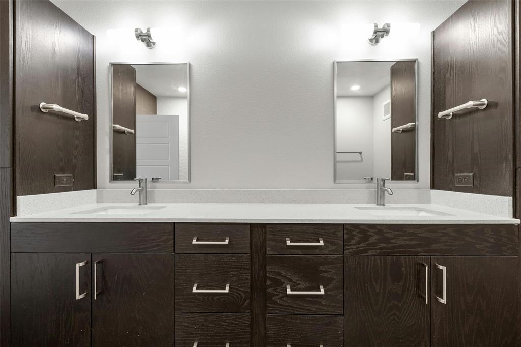 3114 South Congress Avenue, Unit 302 Austin, TX 78704 - Photo 13 of 28 Bathroom 1 with dual vanities