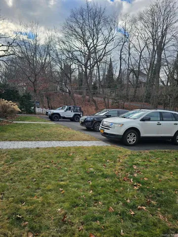 a car parked in front of a house