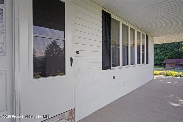an empty room with a bathroom