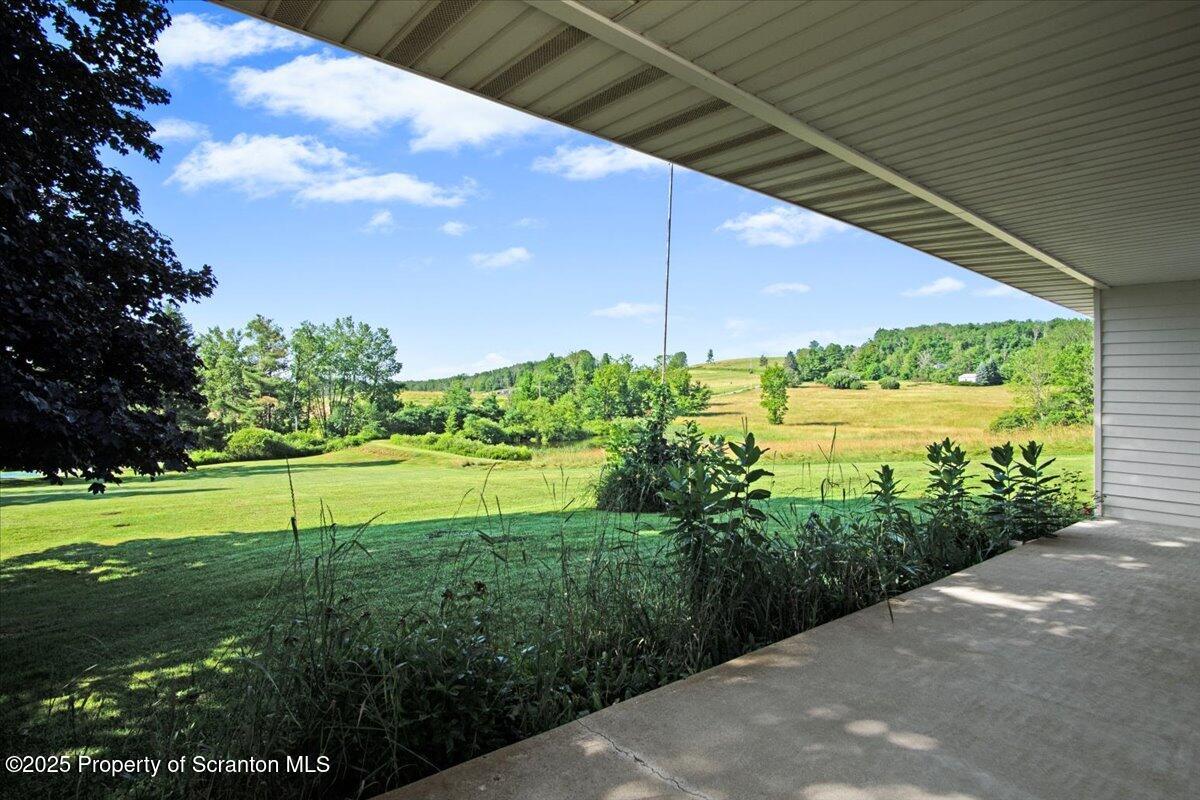 4089 State Rte 2073 Susquehanna, PA 18847 - Photo 16 of 63 a view of a garden with an outdoor space