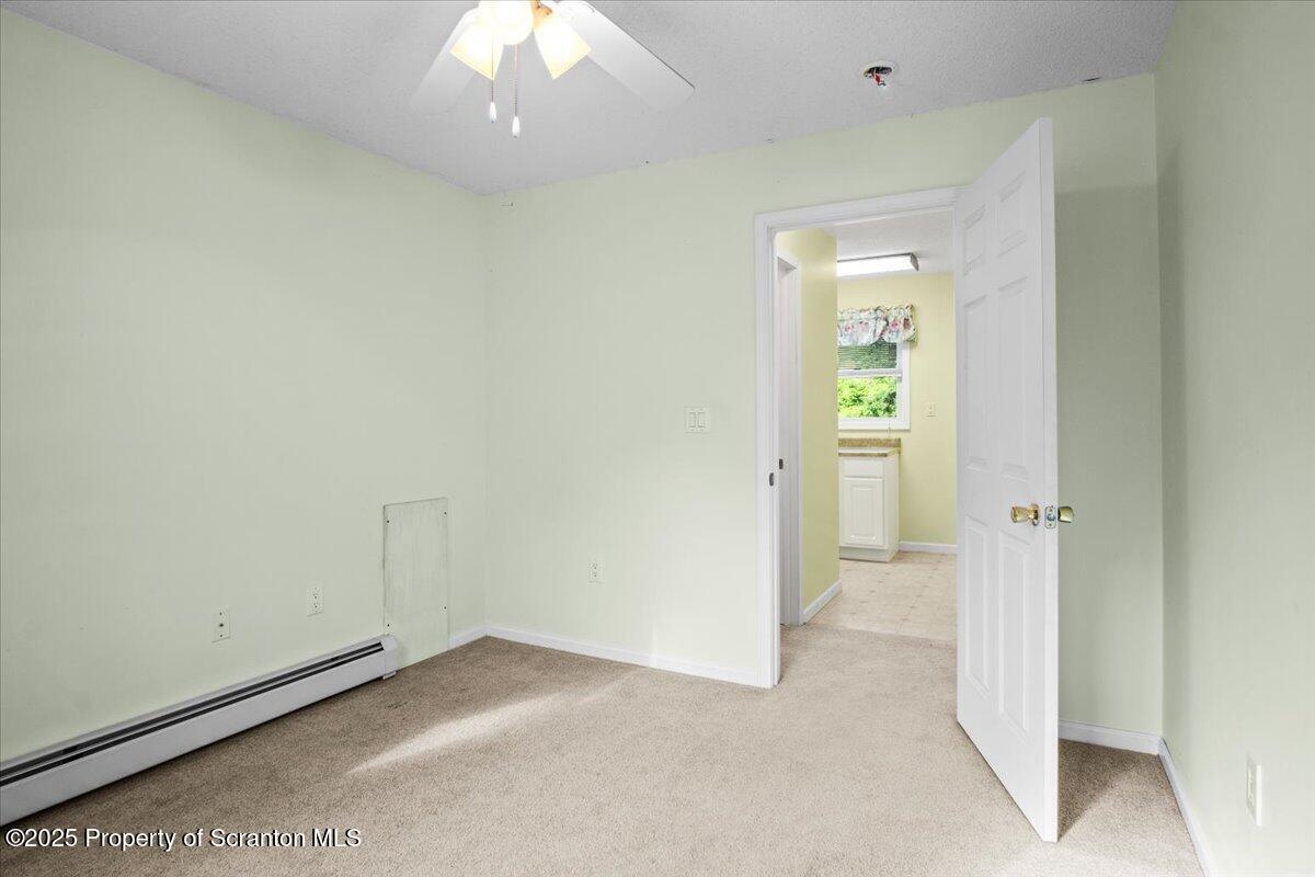 4089 State Rte 2073 Susquehanna, PA 18847 - Photo 19 of 63 an empty room with a bathroom