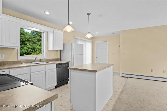 a view of balcony with wooden floor and fence