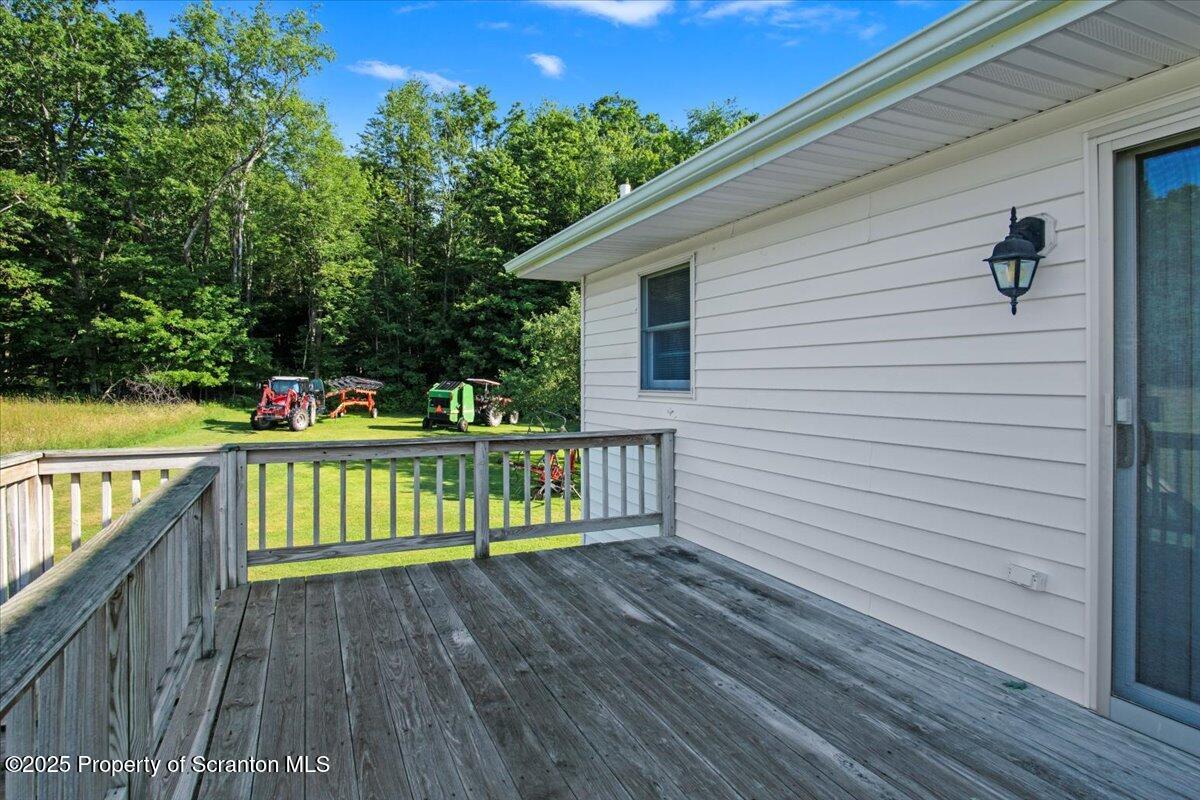 4089 State Rte 2073 Susquehanna, PA 18847 - Photo 37 of 63 a view of a wooden deck