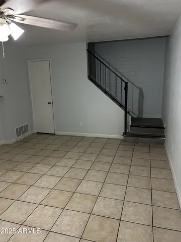 a view of a room with white walls