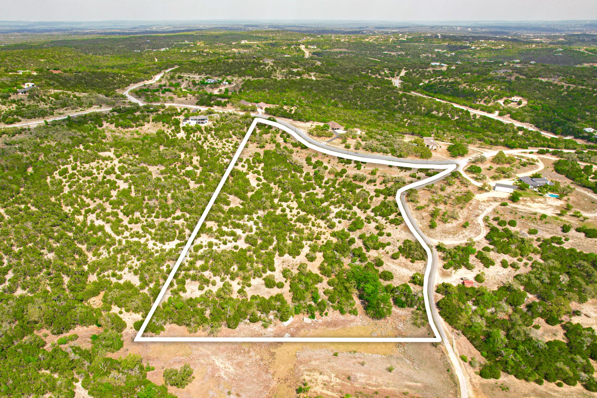 3303 Pattys Way Spring Branch, TX 78070 - Photo 1 of 10 a view of a lake from a window