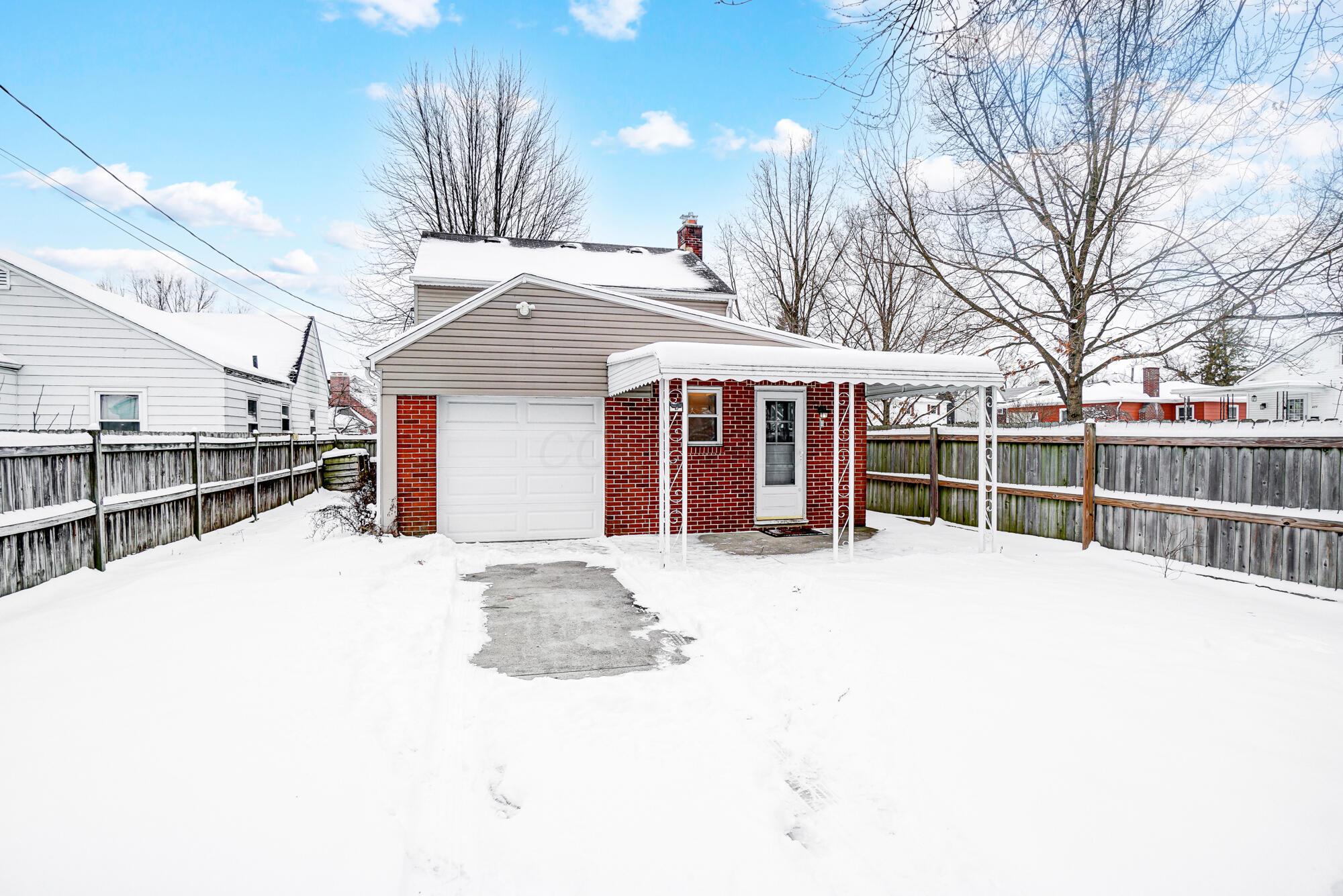 2990 Parkside Road Columbus, OH 43204 - Photo 29 of 34 Nice sized covered back patio and great fenced in yard!