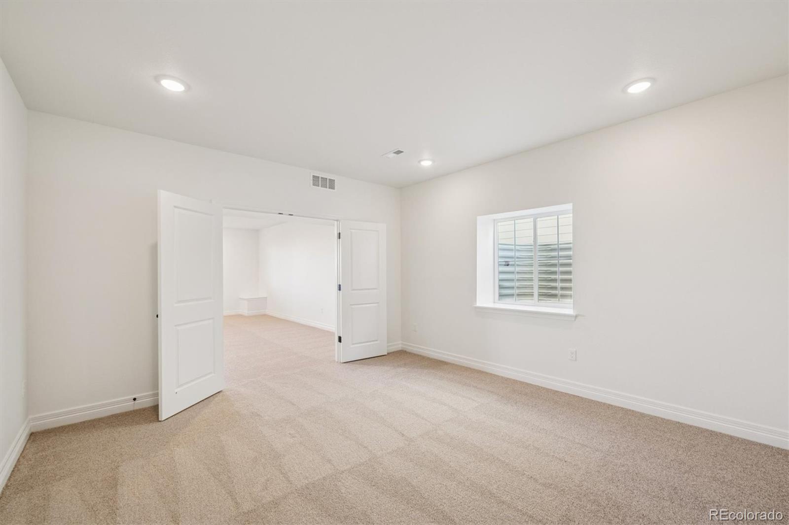 1168 Weller Street Timnath, CO 80547 - Photo 19 of 24 an empty room with a window