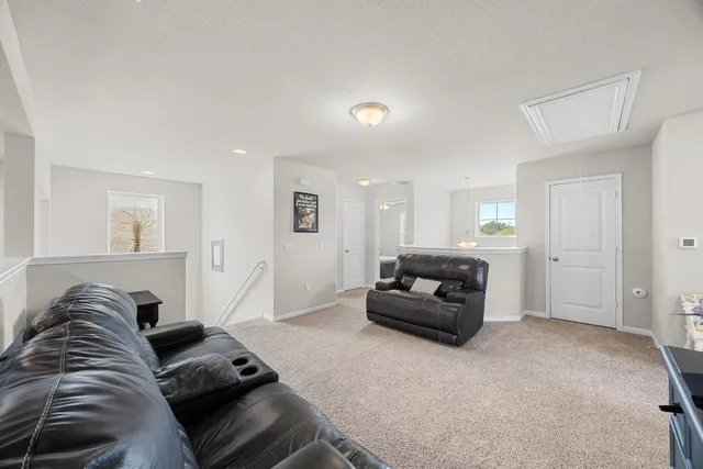a living room with furniture and a couch