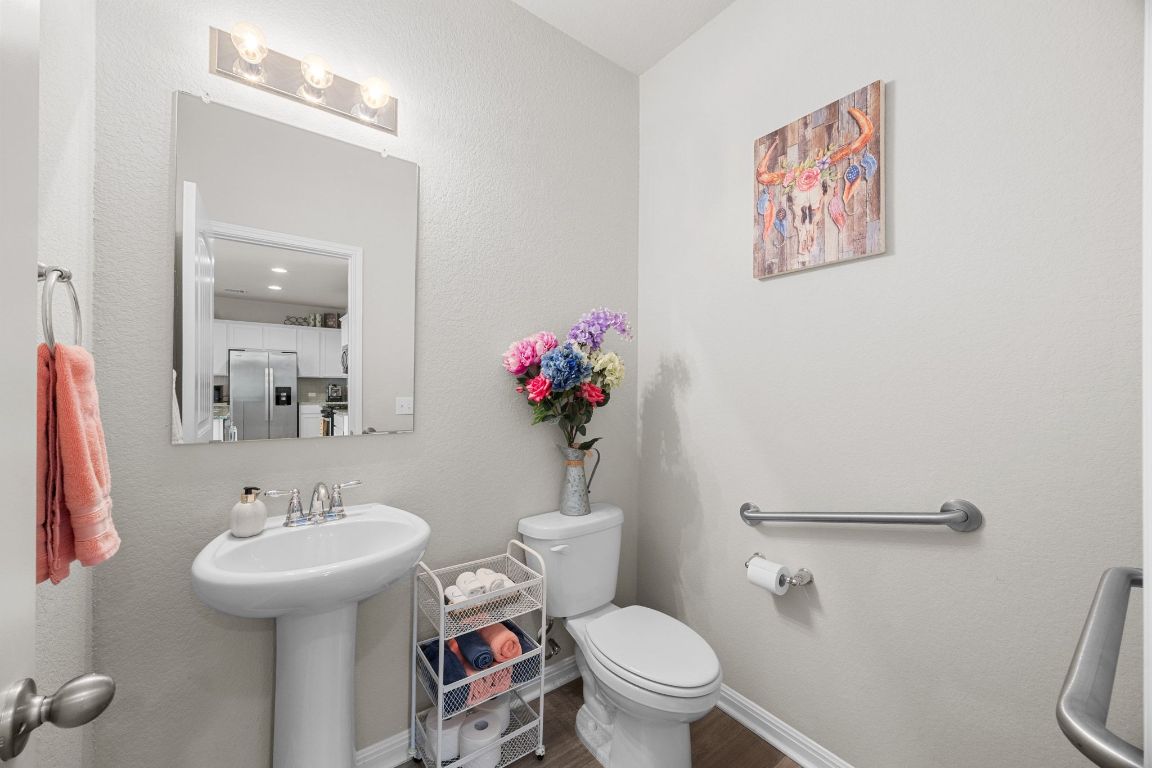 129 Empress Tree Drive Leander, TX 78641 - Photo 10 of 40 Downstairs Half Bathroom