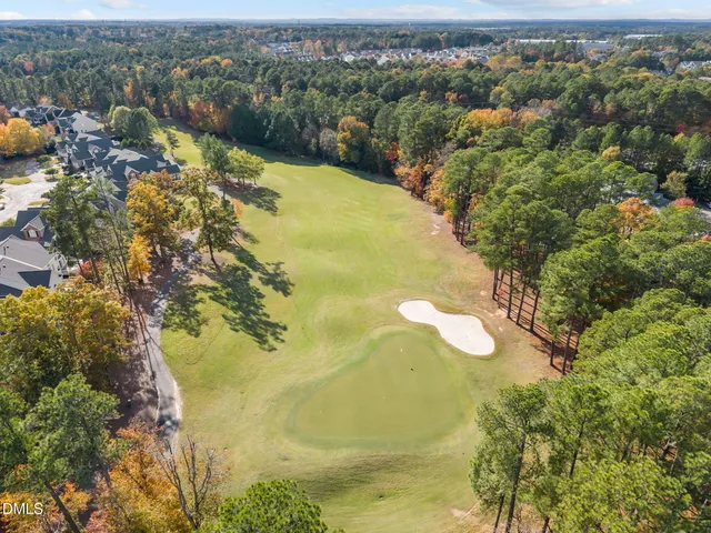 a view of a lake with outdoor seating