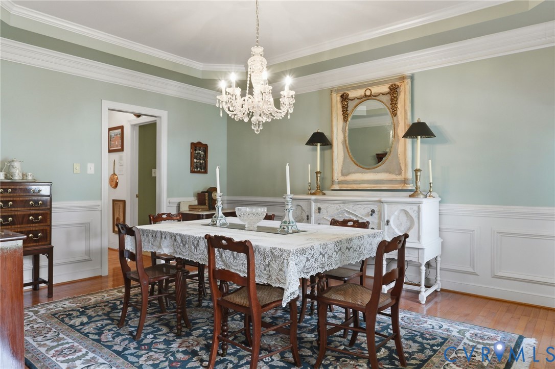 13424 Tipple Point Road Midlothian, VA 23114 - Photo 7 of 53 a view of a dining room with furniture and wooden floor