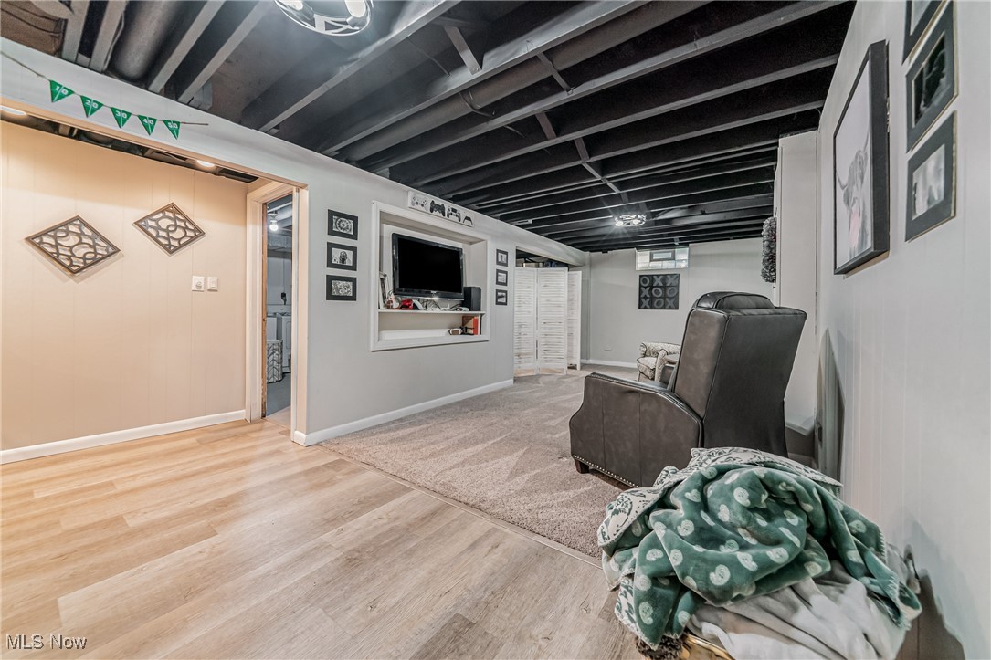 595 Moorfield Road Fairlawn, OH 44313 - Photo 40 of 50 Below grade area with wood finished floors and baseboards