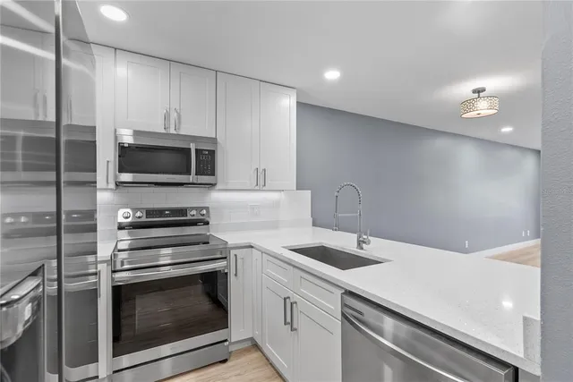 a view of a hallway with front door