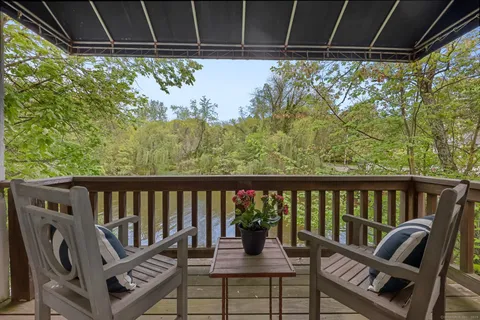 a view of a chair in wooden deck