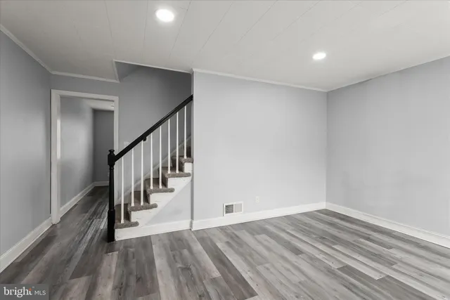 a view of entryway with wooden floor