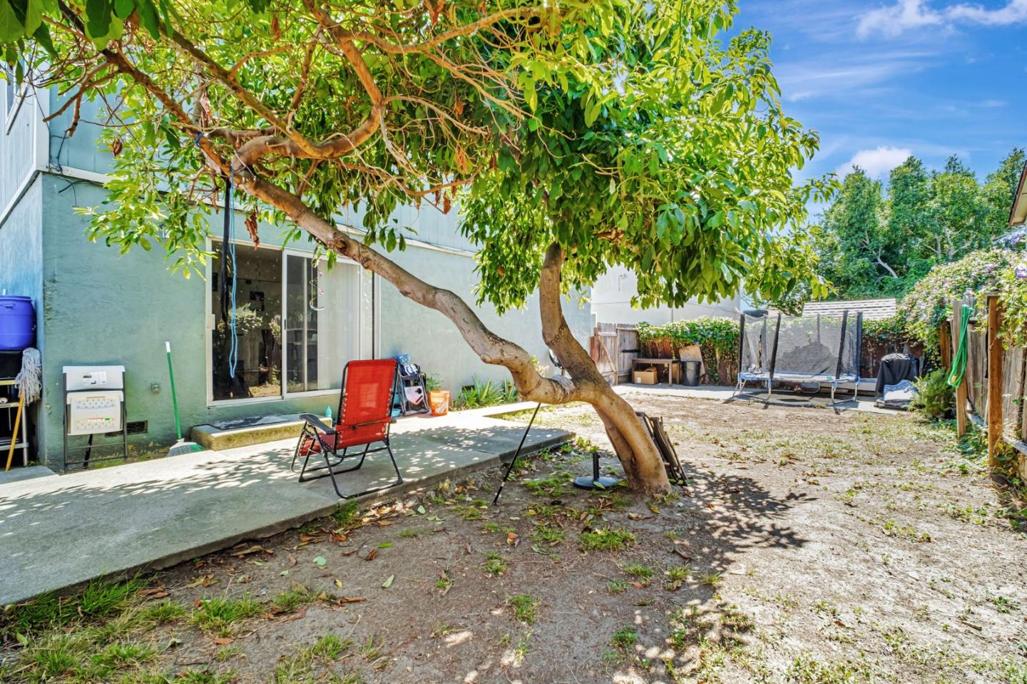 188 Sunset Boulevard Hayward, CA 94541 - Photo 8 of 15 a backyard of a house with barbeque oven table and chairs