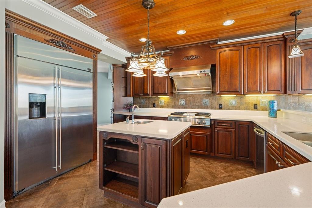 2 Mar Azul North Ponce Inlet, FL 32127 - Photo 29 of 98 a kitchen with a sink stove and refrigerator