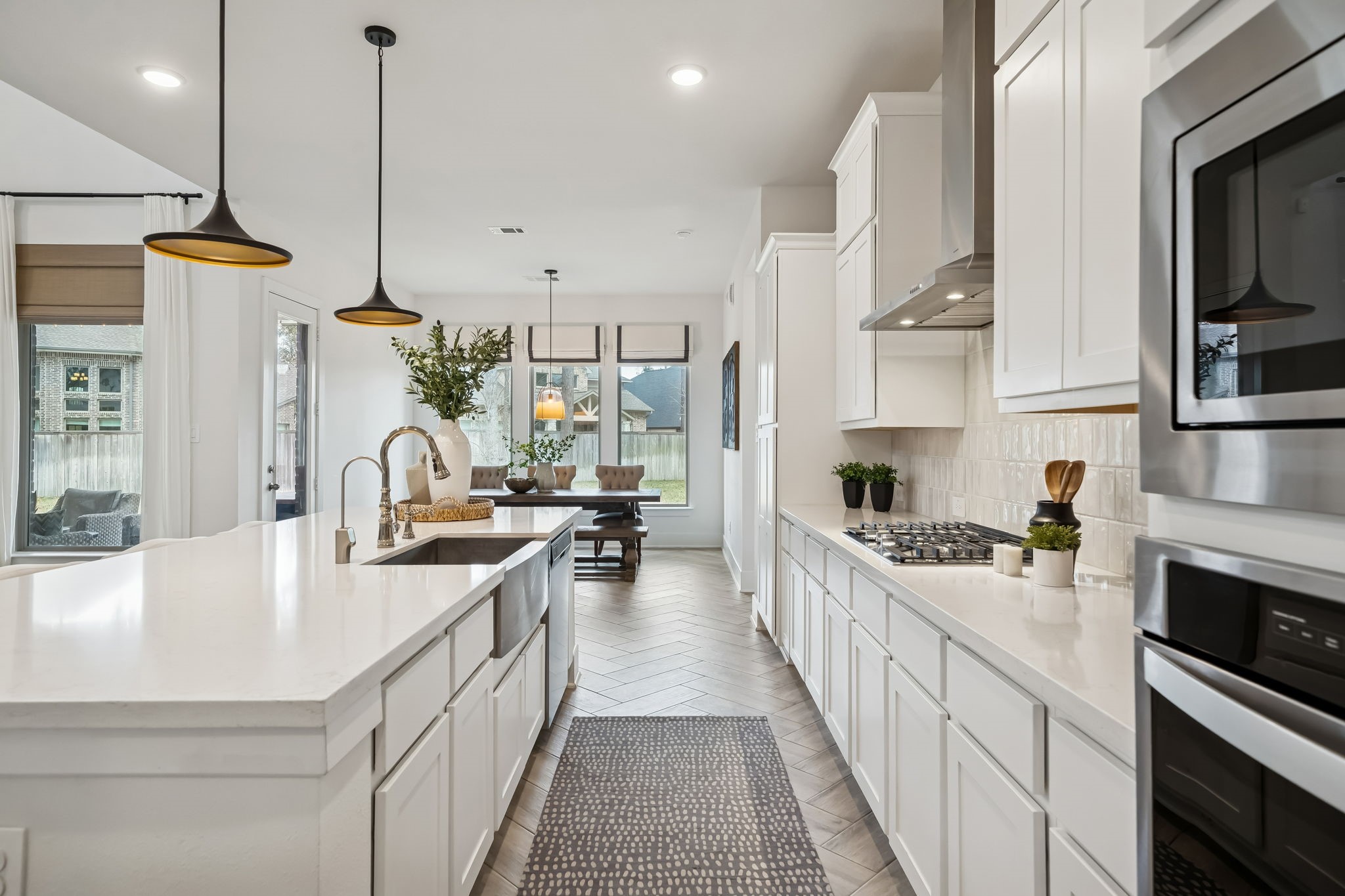 519 Caverna Street Montgomery, TX 77316 - Photo 14 of 41 Thoughtful details at the island sink include a designer faucet, soap dispenser, and reverse osmosis filtration.