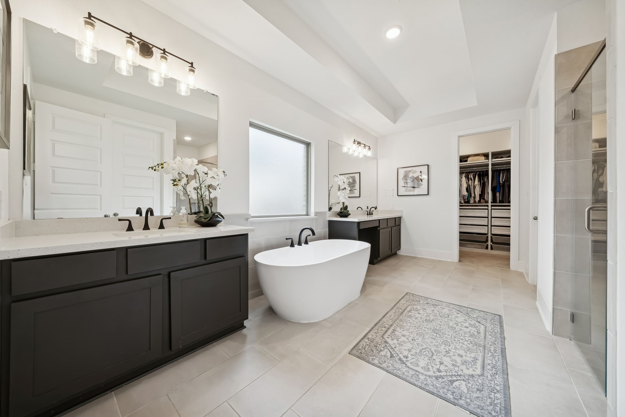 519 Caverna Street Montgomery, TX 77316 - Photo 18 of 41 TWO custom walk in closets with convenient direct access to the laundry room.