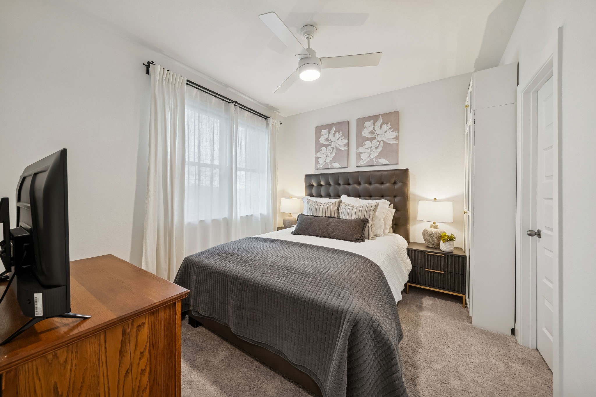 519 Caverna Street Montgomery, TX 77316 - Photo 27 of 41 One of three secondary bedrooms located upstairs featuring a large walk-in closet and convenient access to the upstairs bath.
