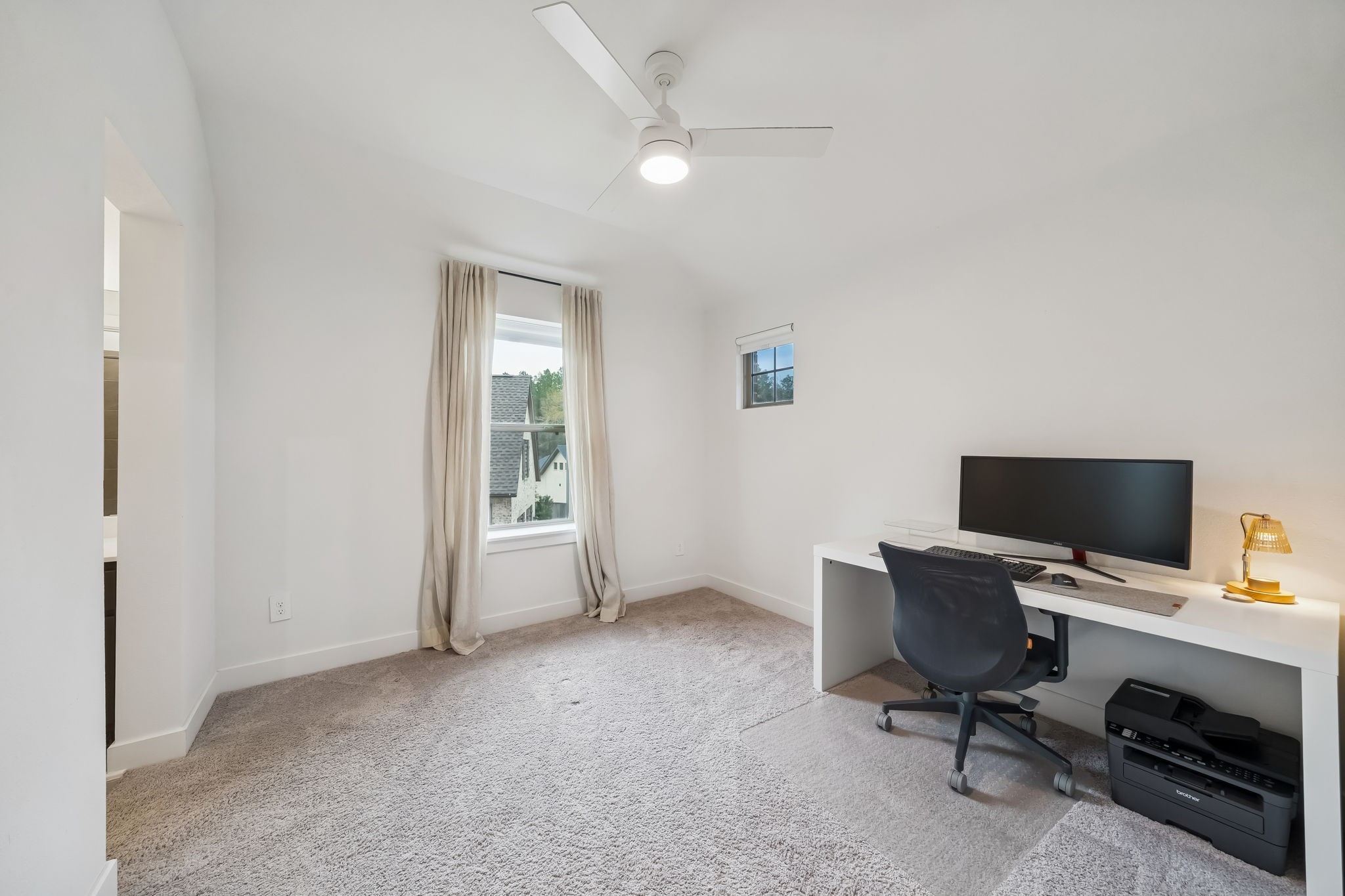 519 Caverna Street Montgomery, TX 77316 - Photo 29 of 41 Secondary bedroom with natural light, large closet, and convenient access to the shared Jack-and-Jill bathroom.