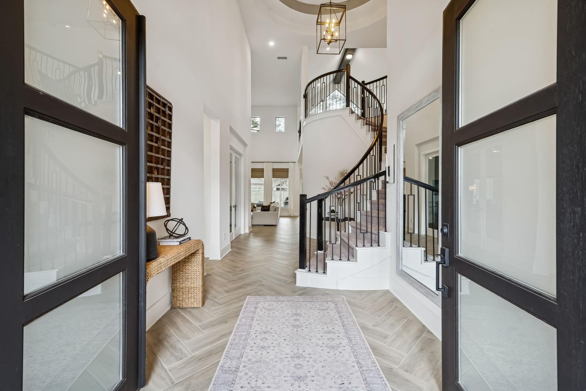 519 Caverna Street Montgomery, TX 77316 - Photo 7 of 41 Double front doors open to an impressive foyer and a sweeping staircase that sets the tone for the home.