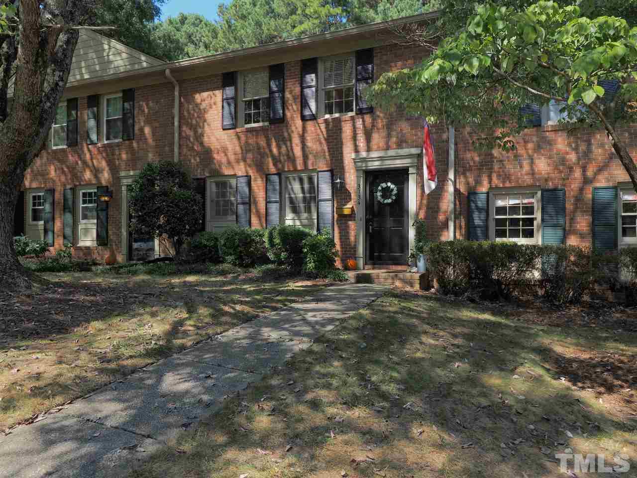 3134 Morningside Drive Raleigh, NC 27607 - Photo 2 of 22 a view of a house with a yard