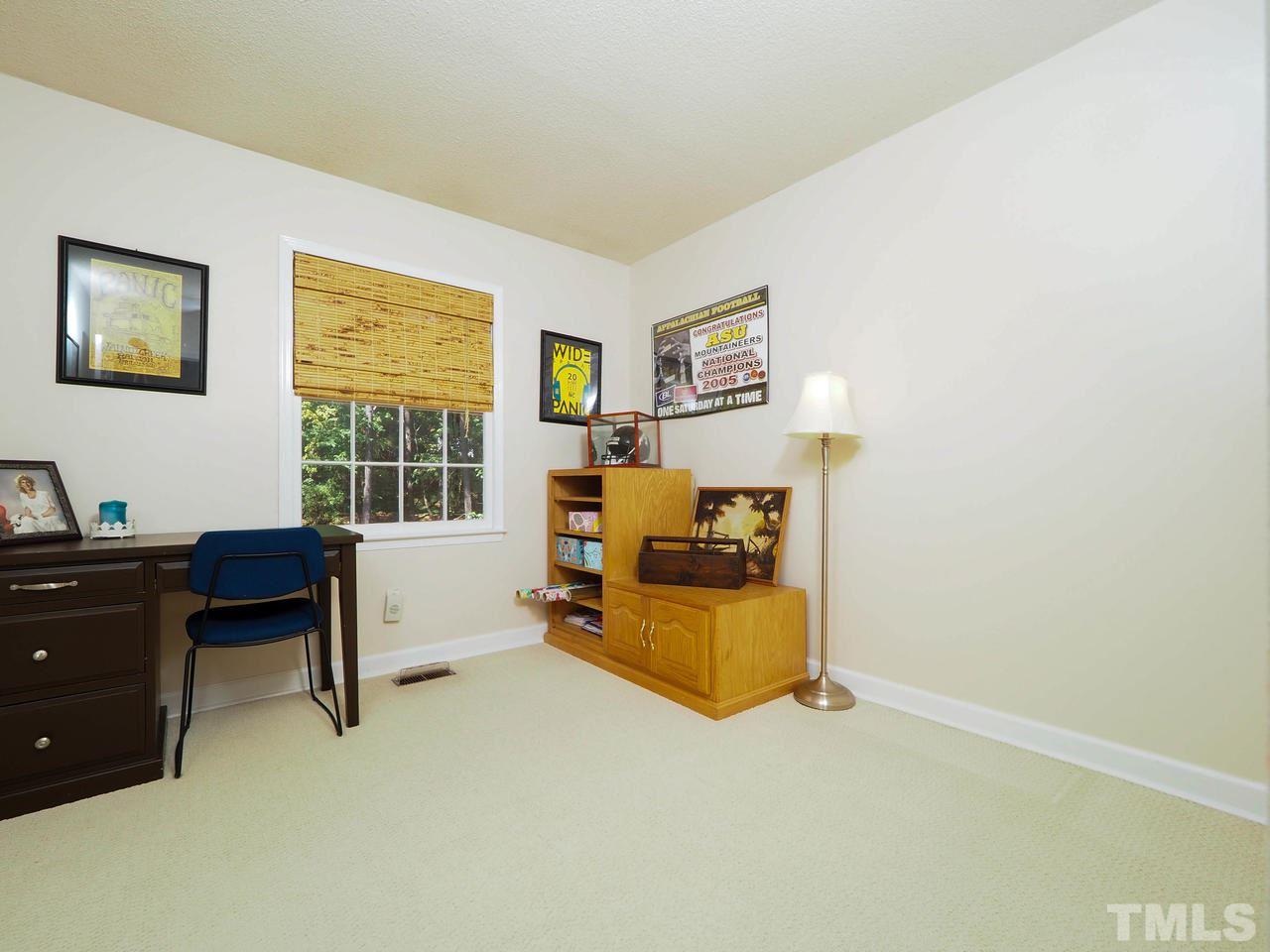 3134 Morningside Drive Raleigh, NC 27607 - Photo 18 of 22 a bedroom with furniture and a window
