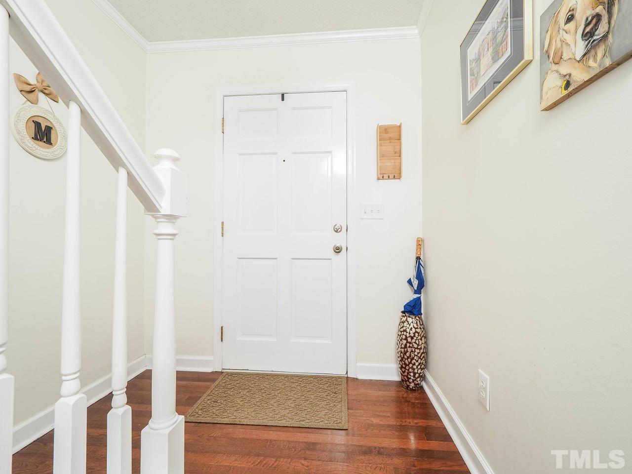 3134 Morningside Drive Raleigh, NC 27607 - Photo 3 of 22 a view of an entryway with wooden floor