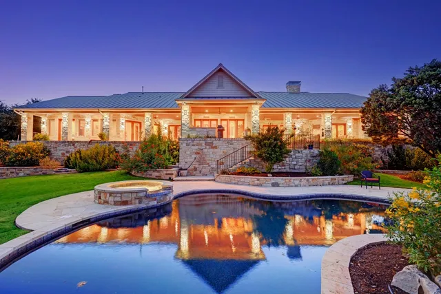 a view of swimming pool and outdoor seating