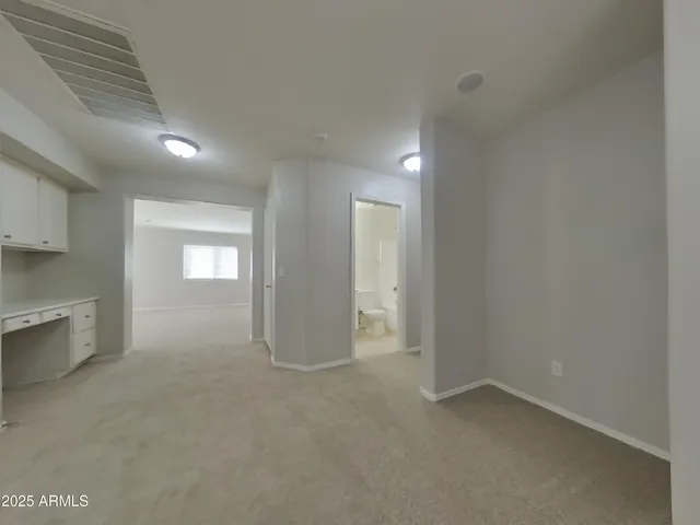 a view of a kitchen and a windows