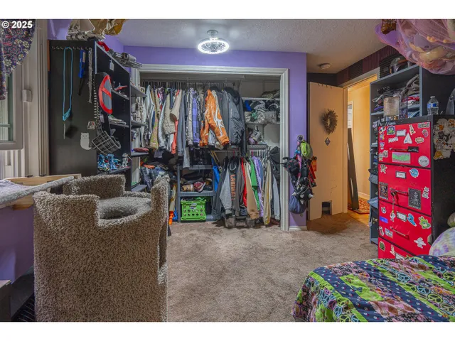 a view of a chairs and table in the patio