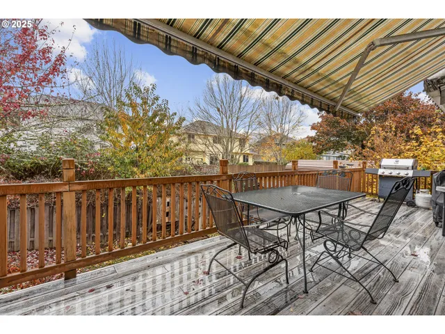 a view of balcony with wooden floor
