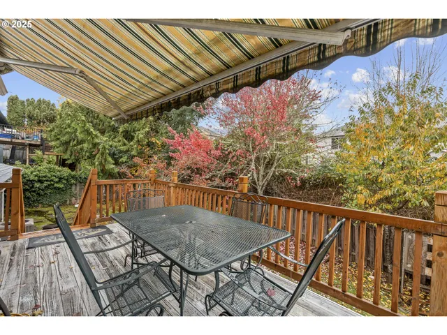 a view of balcony with wooden floor