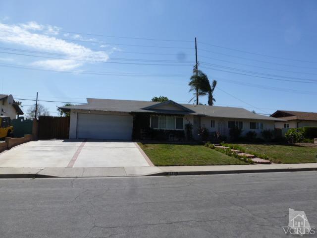 2239 Ralston Street Simi Valley, CA 93063 - Photo 1 of 29 a front view of a house with a yard