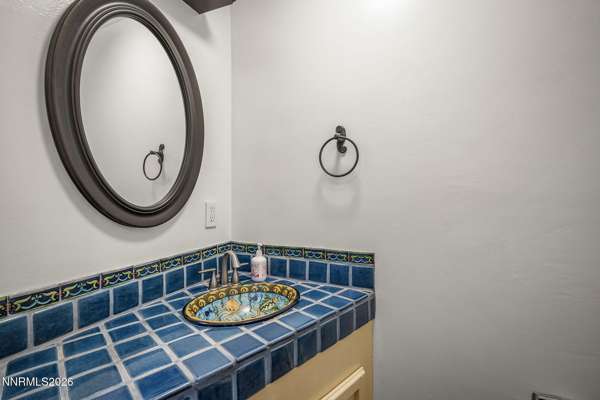 549 Ruby Lane Carson City, NV 89706 - Photo 11 of 37 view of a bathroom with a sink and a mirror