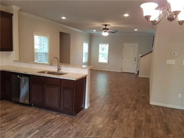 a bathroom with a sink vanity and a mirror