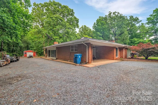 a view of backyard with green space